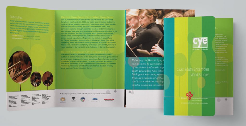 DSO civic brochure with bold stripes of color, a music line, and playful circles that are sometimes photo holders